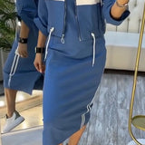 Linda | Sportovně-elegantní set midi šatů a bundy pro moderní ženu